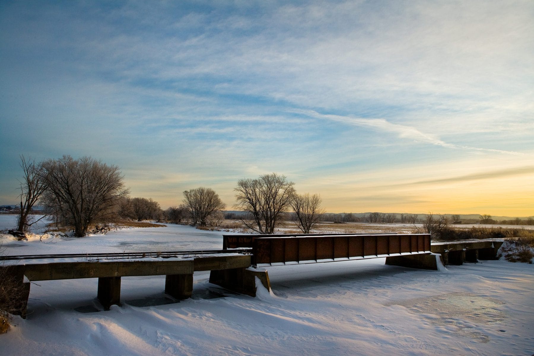 Rail Bridge in winter New Albin Savings Bank